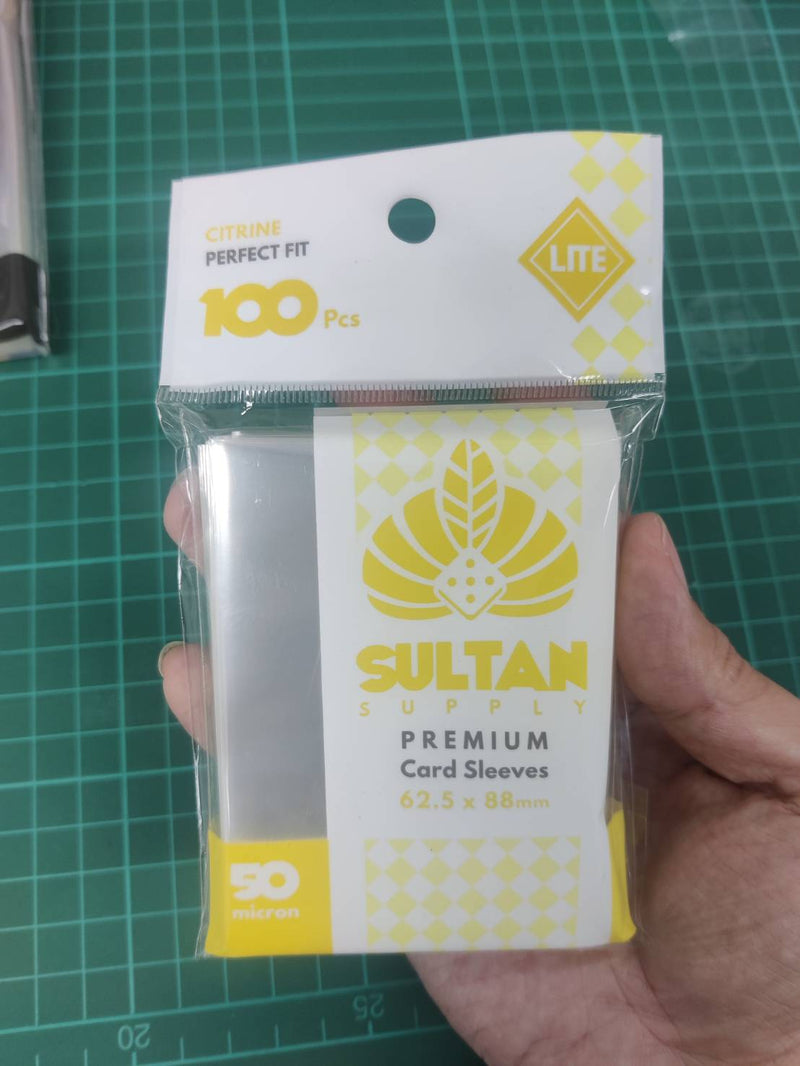 Load image into Gallery viewer, Sultan Supply: 100pcs 62.5 x 88 mm (64.5x90) (Citrine Lite) 50 micron Sleeves
